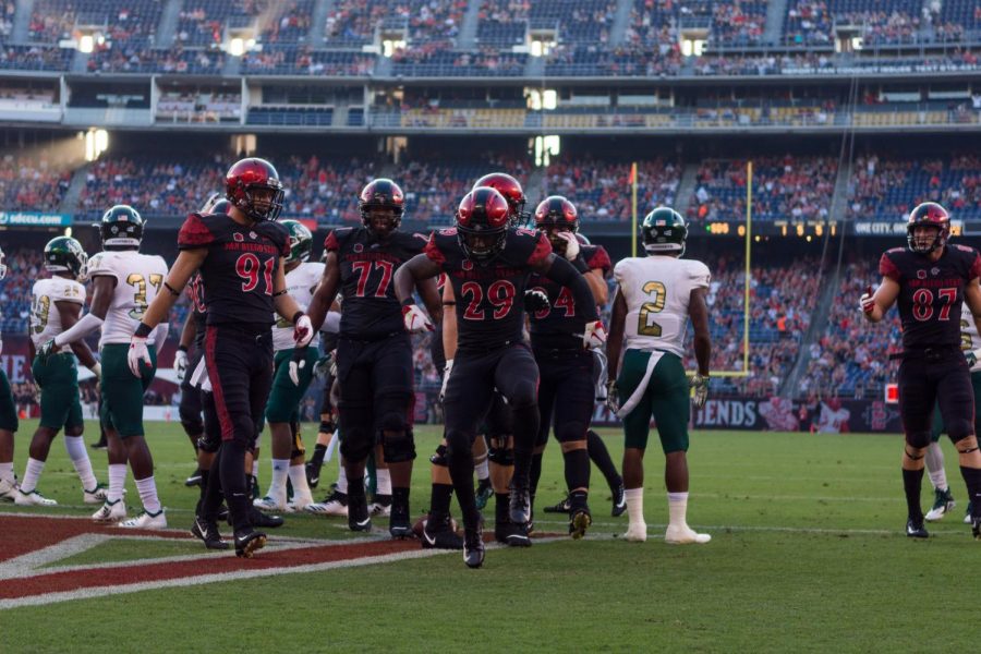 Juwan Washington celebrates after scoring the first of his career-high three touchdowns during the Aztecs 28-14 victory over Sacramento State on Sept. 8 at SDCCU Stadium. 