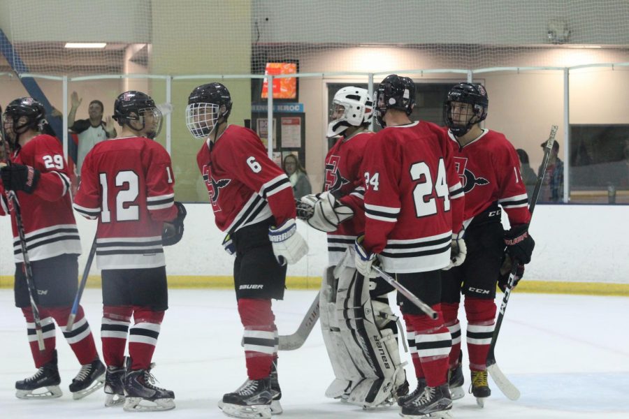 SDSU hockey gathers in a game against UCLA on Oct. 19 at the Joan Kroc Center.