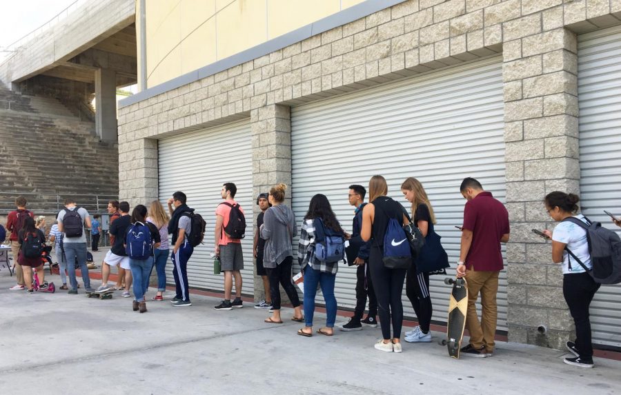 Students line up for meningitis vaccinations outside of Viejas Arena on Oct. 8 after this years first meningitis scare.