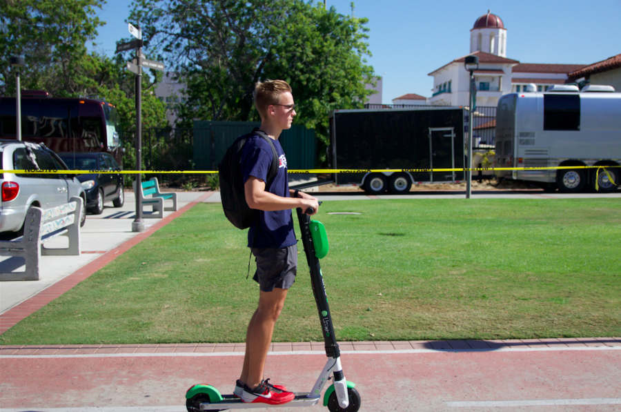 After getting his bike stolen, aerospace engineering freshman Tanner Coleman said he now uses e-scooters on campus to ride back to his dorm after working out at the Aztec Recreation Center. 