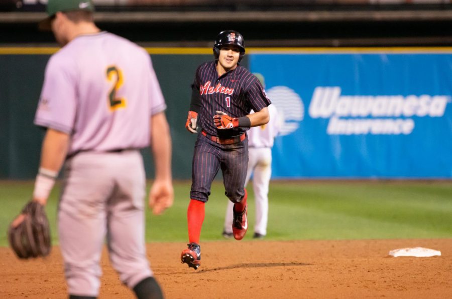 Junior outfielder Julian Escobedo rounds the bases after hitting a home run during the Aztecs 8-4 victory over USF on Feb. 15 at Tony Gwynn Stadium. Escobedo finished with a career-high five RBIs. 