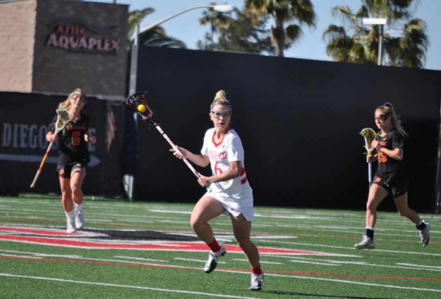 Midfielder Grace McGinity looks down the field during the Aztecs 20-16 loss on Feb. 22 at the Aztec Lacrosse Field.
