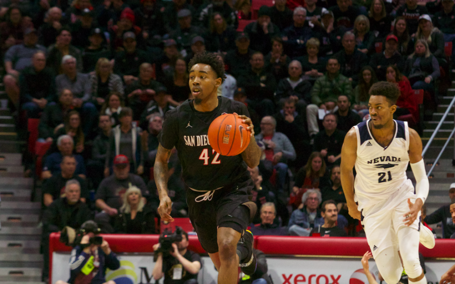 Senior guard Jeremy Hemsley runs up the court during the Aztecs' 65-57 victory over Nevada on Feb. 20 at Viejas Arena.