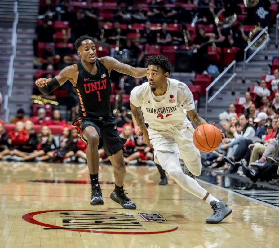 Senior guard Jeremy Hemsley drives past his defender during the Aztecs’ 94-77 victory over UNLV on Jan. 26 at Viejas Arena.