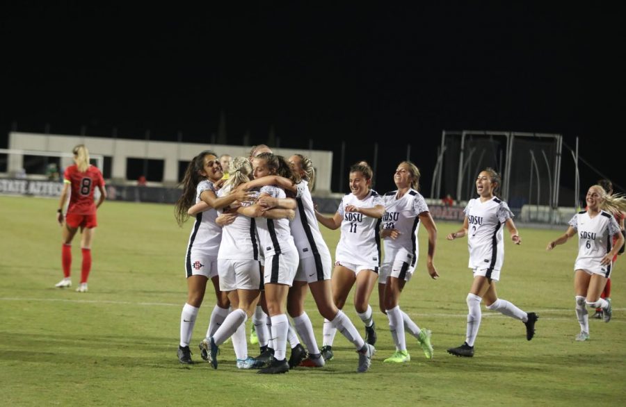 San Diego State womens soccer celebrates a goal by senior forward Darcy Weiser during the Aztecs 1-0 win over UNLV on Oct. 4 at the SDSU Sports Deck. 