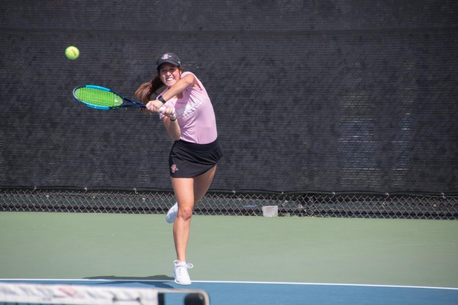 Junior Abbie Mulbarger swings at the ball during the SDSU Fall Classic I on Sept. 29, 2019 at Aztec Tennis Center.