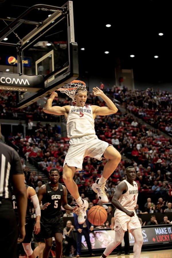 Senior forward Yanni Wetzell finishes a dunk in the Aztecs 86-61 win over Grand Canyon University at Nov. 13 at Viejas Arena.