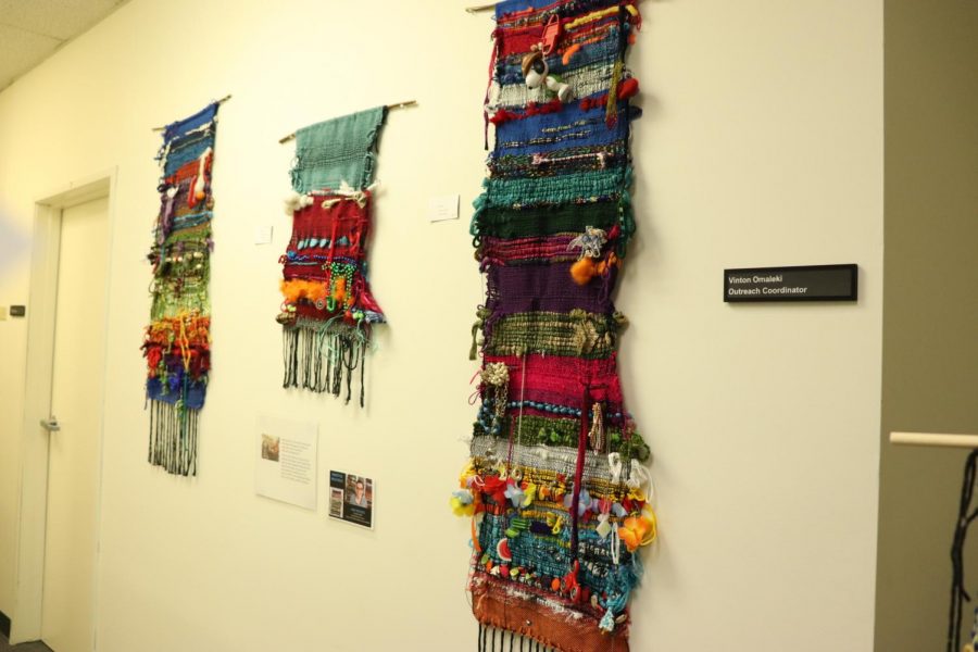 Alex Nichols makes woven wall art along with scarves, bowls and ornaments.