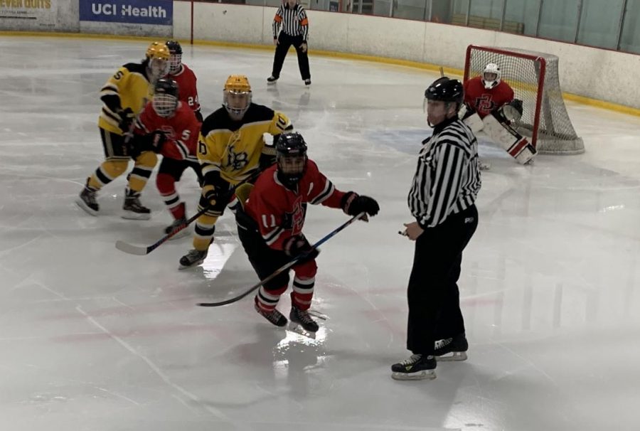 Senior defender Devyn Taras leads the pack of players looking to gain possession of the puck during SDSUs 4-2 win on Dec. 6 at Lakewood Ice in Long Beach, CA.