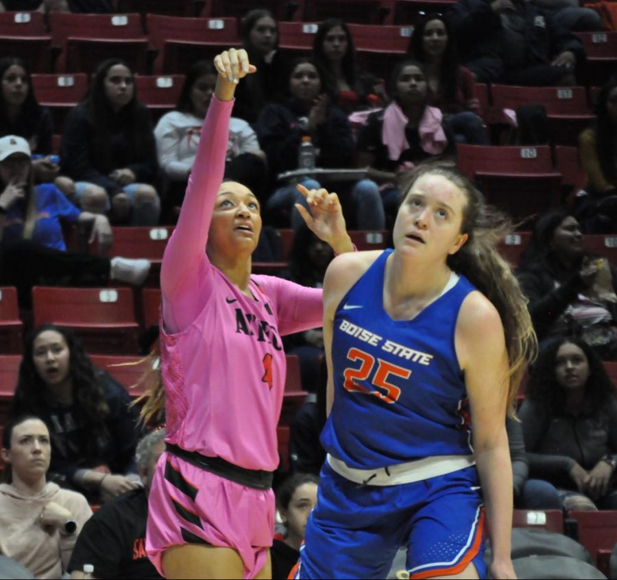 Senior forward Monique Terry fires a 3-pointer over a Boise State defender during the Aztecs 69-67 overtime loss on Feb. 15 at Viejas Arena.