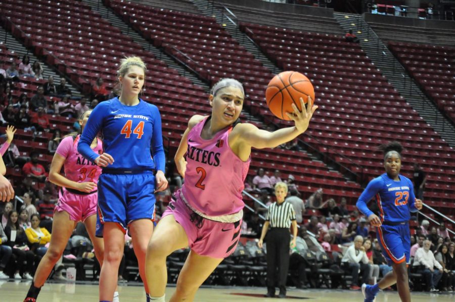 Sophomore guard Sophia Ramos attempts to control the ball during the Aztecs 69-67 loss to Boise State on Feb. 15 at Viejas Arena. Ramos finished the game with a career-high in rebounds (14).
