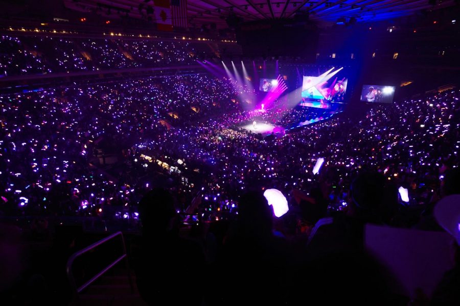 Fans brought in light sticks that sync to the music.
