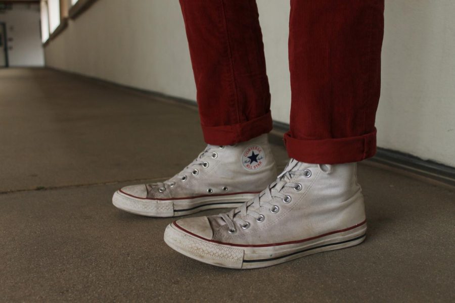 Converse are his go to shoes because they go with everything.