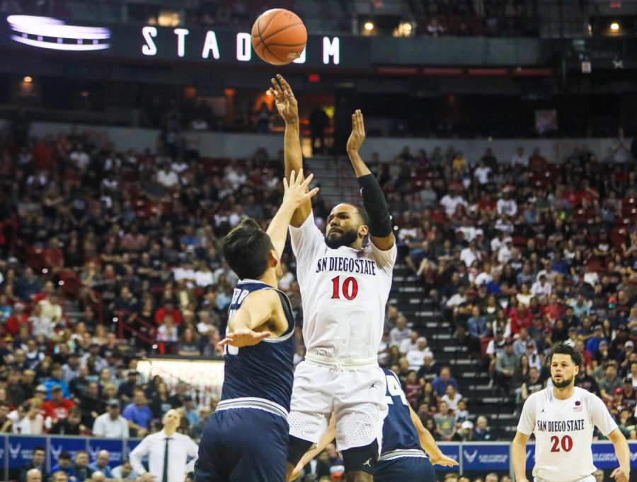 Then-senior guard KJ Feagin attempts a shot during the Aztecs’ 59-56 loss against Utah State at the Thomas and Mack Center on March 7.