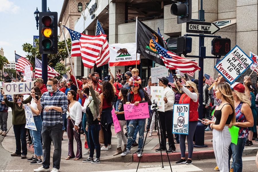Protestors+gather+in+Downtown+San+Diego+in+opposition+to+California+Governor+Gavin+Newsoms+stay-at-home+order+on+April+18.+The+protest+persisted+despite+local+regulations+limiting+large+gatherings.