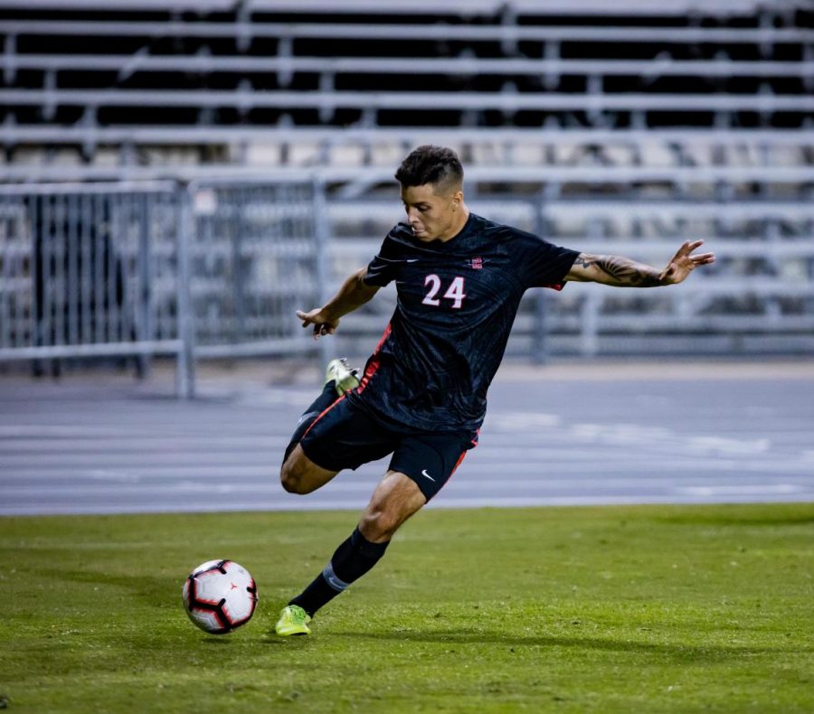 Then-sophomore midfielder Arturo Chavez looks to cross the ball into the penalty area during the Aztecs' 1-0 overtime loss to Oregon State on Oct. 24, 2019 at the SDSU Sports Deck.