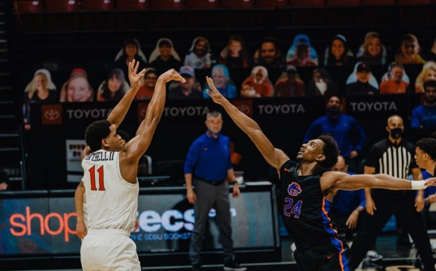 San Diego State mens basketball senior forward Matt Mitchell fires a 3-pointer during the Aztecs' 78-66 overtime win over Boise State on Feb. 25 at Viejas Arena.