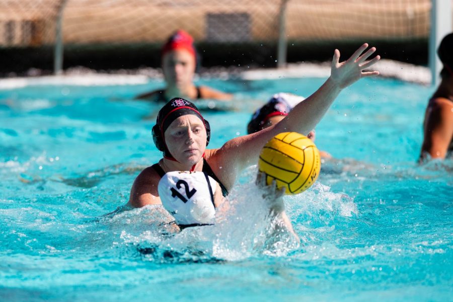 San Diego State water polo senior utility Emily Bennett defends a UC Irvine player during the Aztecs series against the then-No. 4 Anteaters on Feb. 20 at the Aztec Aquaplex.