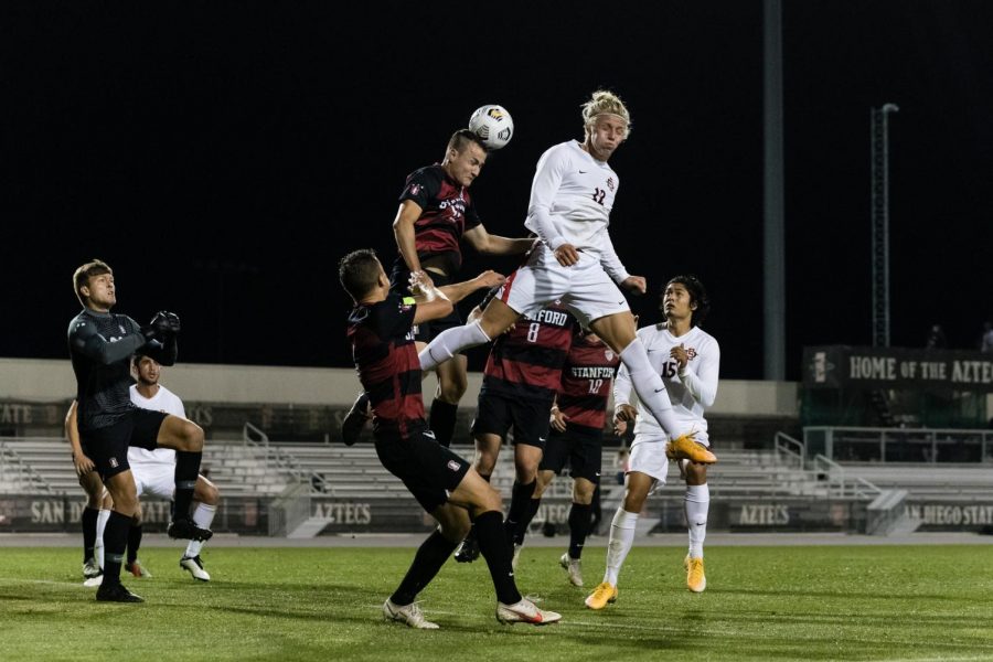 San Diego State mens soccer sophomore forward Austin Wehner goes up for a header during the Aztecs’ 1-0 loss to the Cardinal on Feb. 27 at the SDSU Sports Deck.