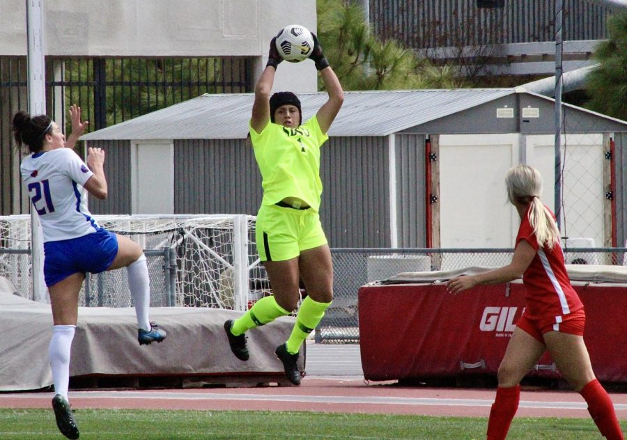 San Diego State women's soccer goalkeeper Alexa Madueno catches the ball during the Aztecs' 3-1 win over Boise State on March 7, 2021 at the SDSU Sports Deck.
