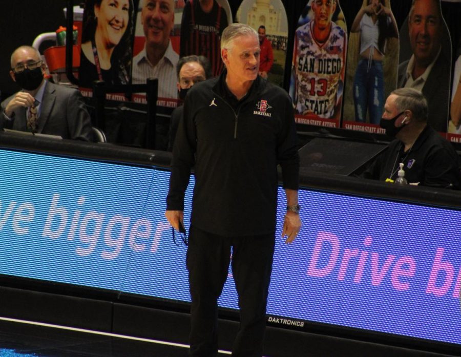 San Diego State men's basketball head coach Brian Dutcher gives instructions to a player during the Aztecs' 69-67 win over Nevada on Jan. 9, 2021 at Viejas Arena.
