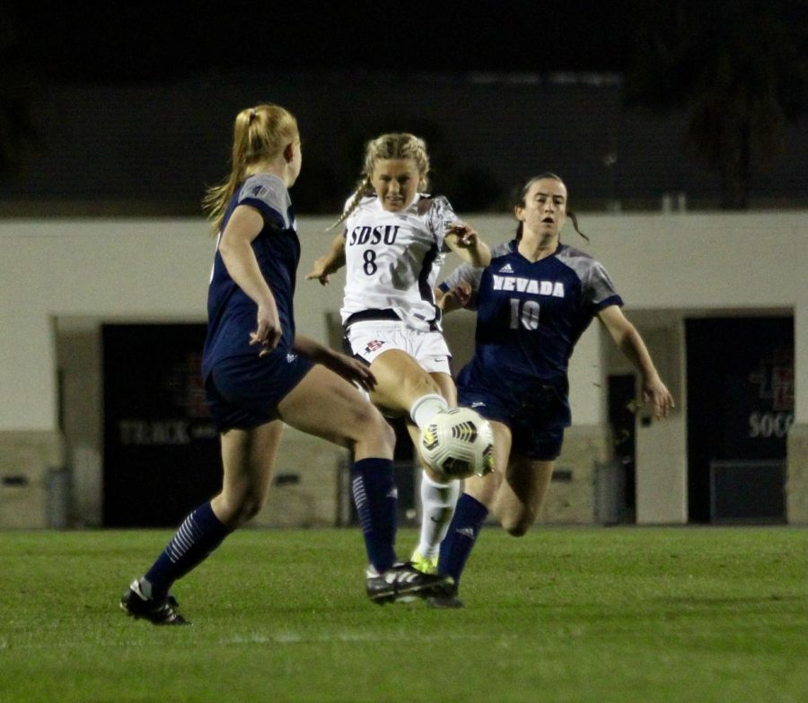 San Diego State womens soccer senior midfielder Chloe Frisch shoots the ball during the Aztecs 3-2 over Nevada on March 5, 2021 at the SDSU Sports Deck.