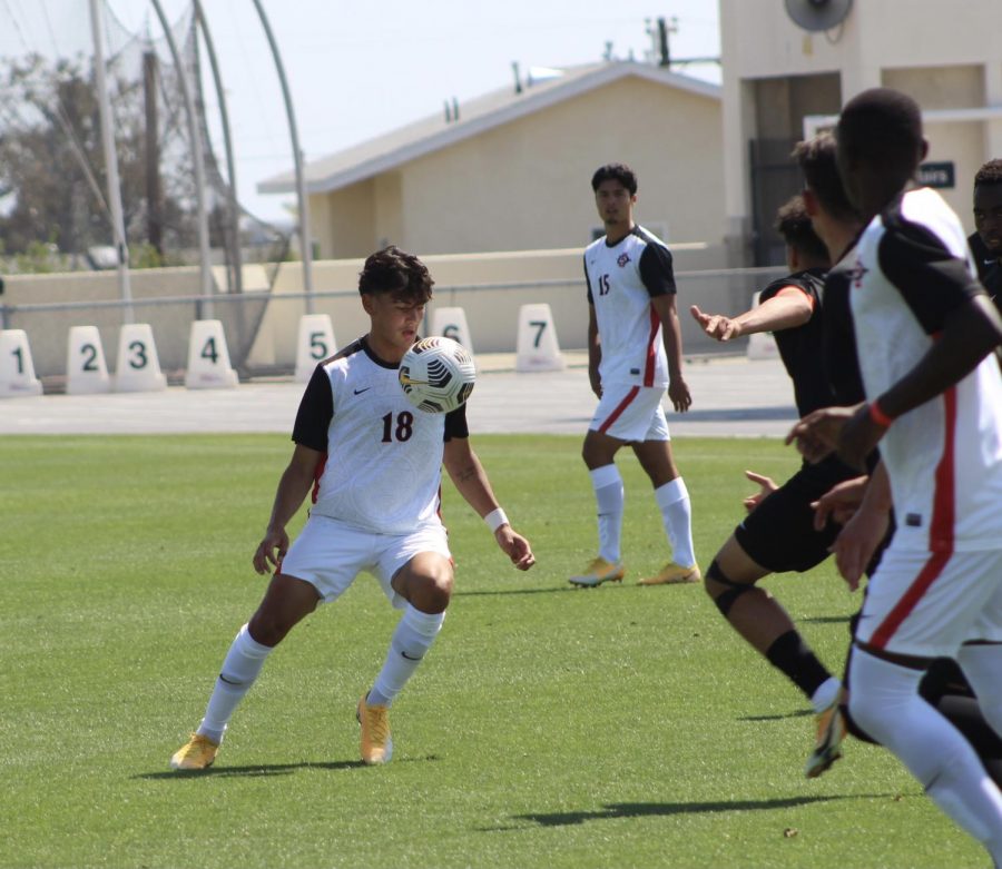 San Diego State mens soccer freshman midfielder Andre Ochoa looks at the ball during the Aztecs 4-0 loss to Oregon State on April 17, 2021 at the SDSU Sports Deck.