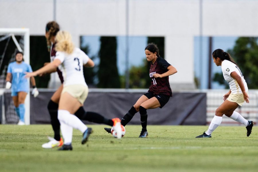 Denise Castro (11) fields the ball during a match against Army West Point (Courtesy of SDSU Athletics)