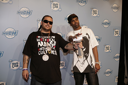 Rappers Belly (left) and Ginuwine was an attendee at the 2007 MuchMusic Video Awards, held the night of Sunday, June 17, 2007 in Toronto, Ontario, Canada. By Professional photographer Robin Wong. - http://www.robinwong.ca/press_release_jpg_web.zip, CC BY 2.5, https://commons.wikimedia.org/w/index.php?curid=2300438