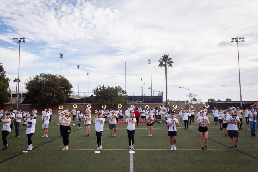 SDSUs marching band practicing the Fight Song on field PG620. 