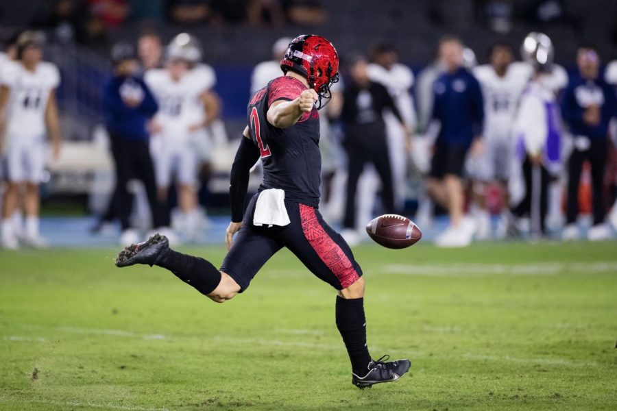 Matt Araiza setting up for a punt.