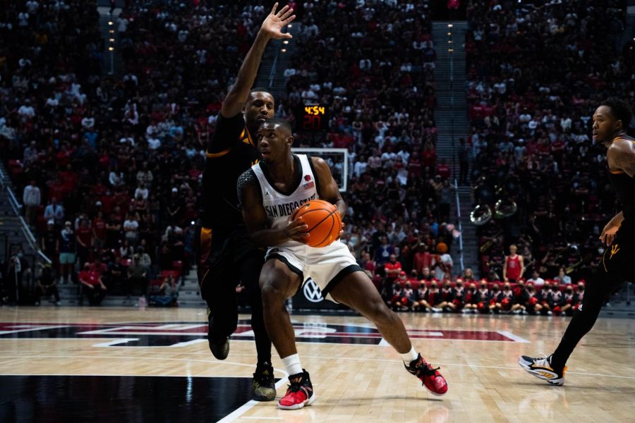 Lamont Butler (center) driving to the basket against Arizona State. Butler finished the game with 14 points.