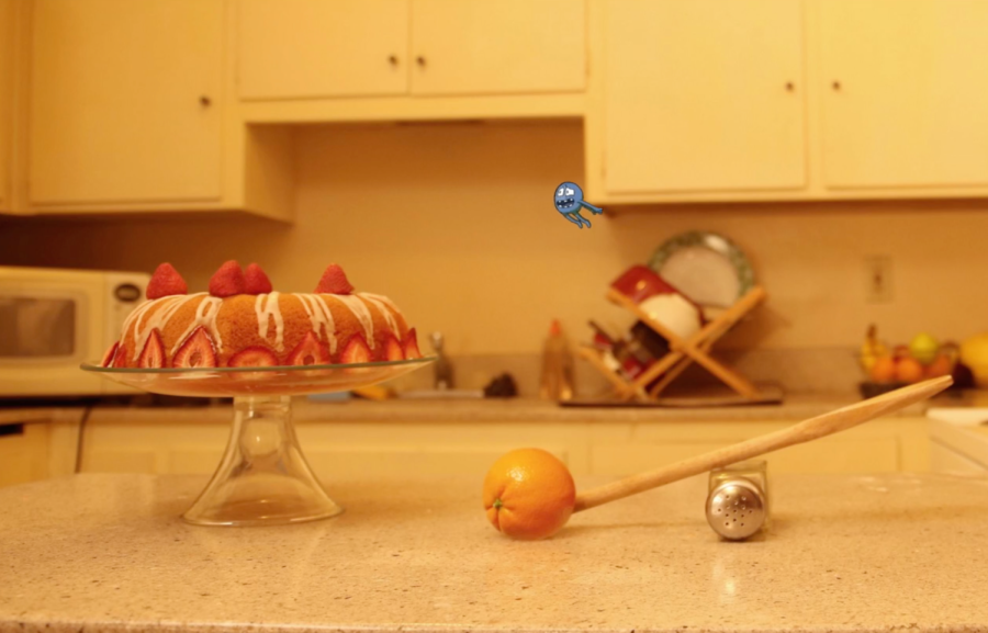 The student short film Sweet Tooth directed by Kelse Whitfield and Lucas Hespenheide follows a blue animated character who schemes to eat a cake on the kitchen counter.