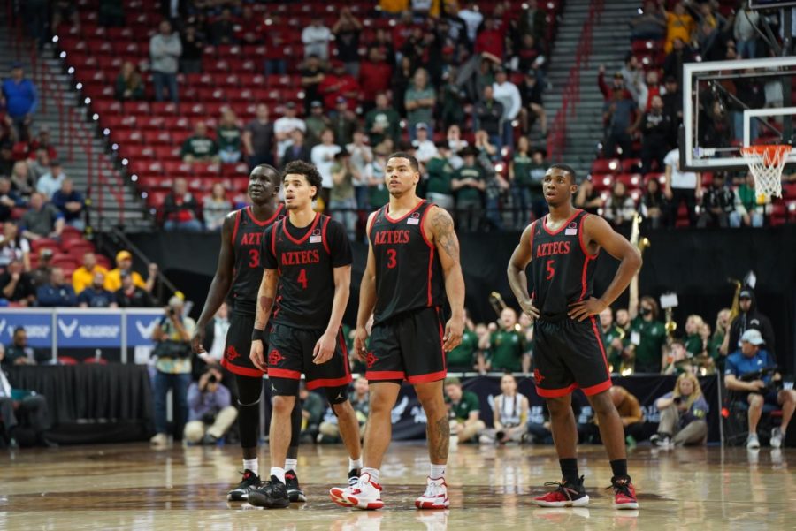 (From left to right) Aguek Arop, Trey Pulliam, Matt Bradley and Lamont Butler during the 2021-2022 Mountain West Tournament.