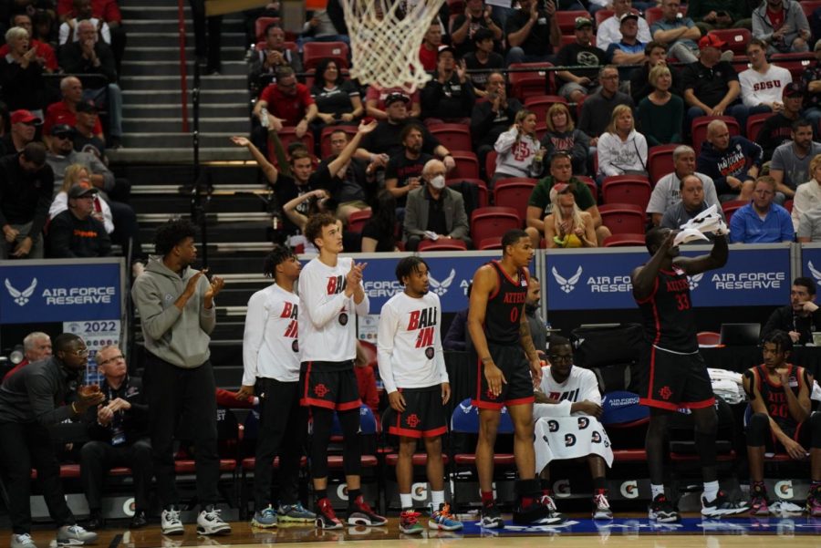 Players on the SDSU bench during the Mountain West Tournament
