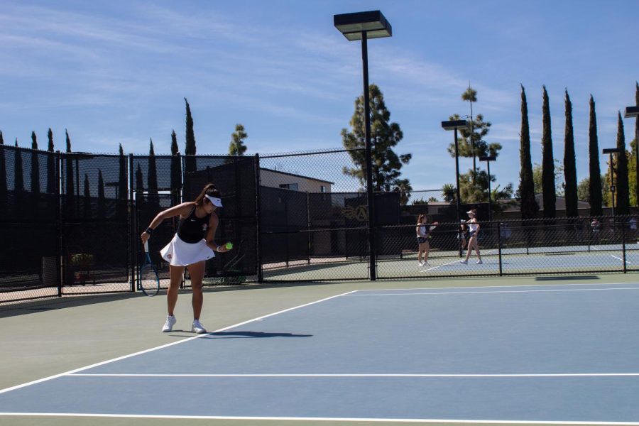 Senior+Bunyawi+Thamchaiwat+prepares+for+a+serve+at+the+Aztec+Tennis+Center.