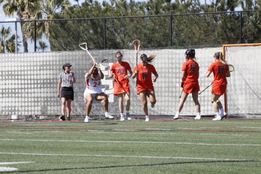 Senior Deanna Balsama (#24) celebrates after scoring a goal versus the Princeton Tigers on March 12.