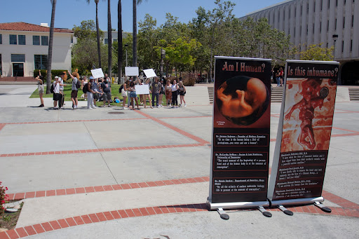 The anti-abortion group obtained permits from the university for their graphic display in front of Hepner Hall.
