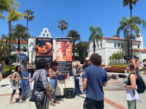 Some students participated in discussions with the anti-abortion group, other took to the pavement with chalk and drew pro-choice imagery. 