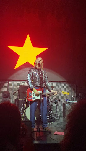 Wyatt Shears (aka Enjoy) singing and playing bass for a crowd of long-time Vada Vada fans at Music Box on Sunday, April 24.