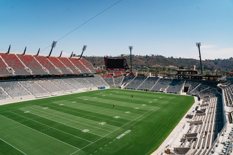 The empty Snapdragon Stadium will soon be filled with scarlet and black athletes and fans. 