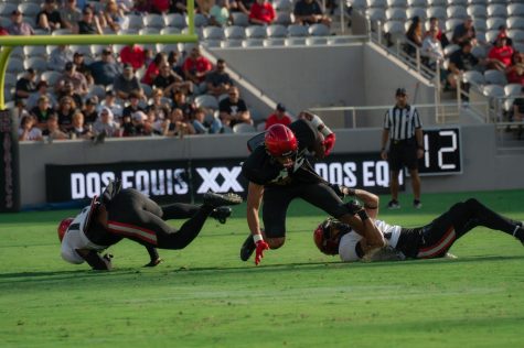 Jesse Matthews is tackled