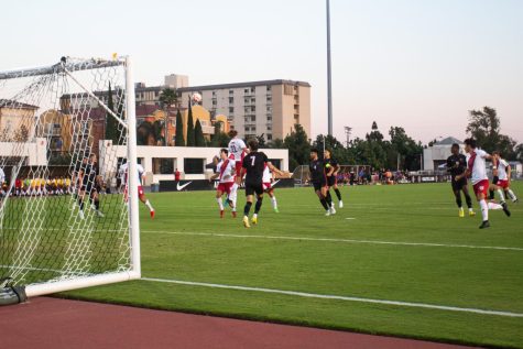 An Aztec cross is well defended by the Lions during the Aztecs’ 2-1 loss on Aug. 28, 2022. 