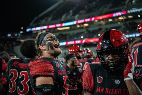 San Diego State University senior Caden McDonald shouts in excitement following the Aztecs 38-7 victory over Idaho State University at Snapdragon Stadium on Saturday, Sept. 10. 