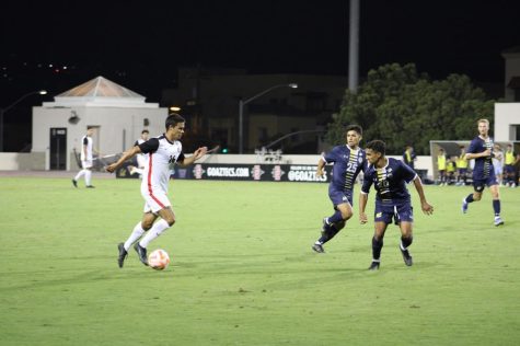 Senior Blake Bowen takes on a UCSD defender in a 1-0 SDSU triumph on September 24th, 2022 at the SDSU Sports Deck.