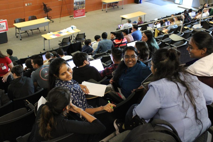 Graduate+students+Surbhi+Sawant%2C+Mukta+Joshi%2C+and+Rachana+Vimal+Gandhi+brainstorm+for+their+first+challenge+at+the+SDSU+Hackathon+on+October+8th%2C+2022.