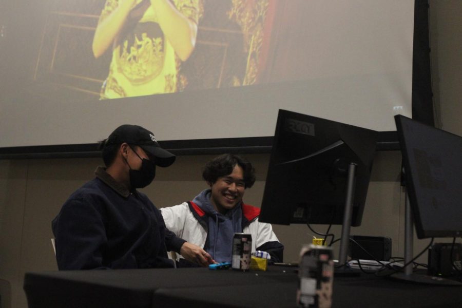 Students play Super Smash Bro Ultimate on an Nintendo Switch provided at the event.