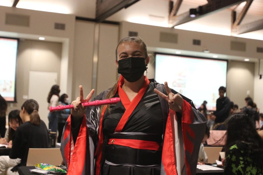 Aly Maclennan cosplays as Wei Wuxian from Mo Dao Zu Shin while attending the event.