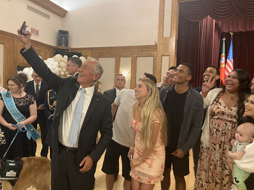 The 'President of Selfies' snaps a photo with SDSU students at the S.E.S. Portuguese Hall of San Diego after his speech.