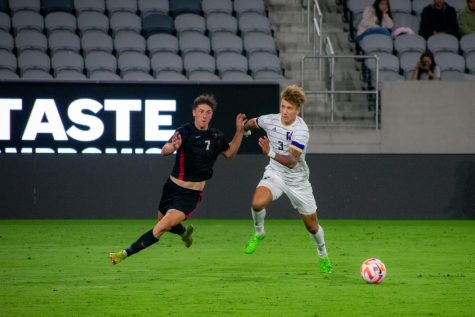 Freshman CJ Fodrey attacks the ball during the Aztecs 2-0 loss versus the University of Washington on Sept. 29, 2022.